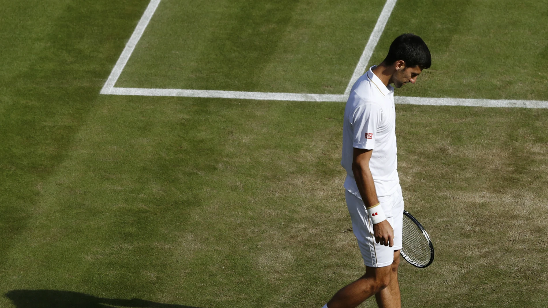 Djokovic, cabizbajo en Wimbledon Djokovic, cabizbajo en Wimbledon