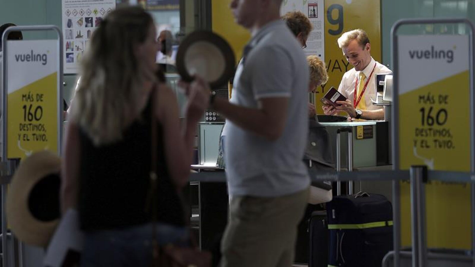 Pasajeros en el aeropuerto de El Prat.