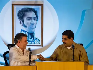 Maduro y Santos acuerdan reabrir la frontera Maduro y Santos acuerdan reabrir la frontera