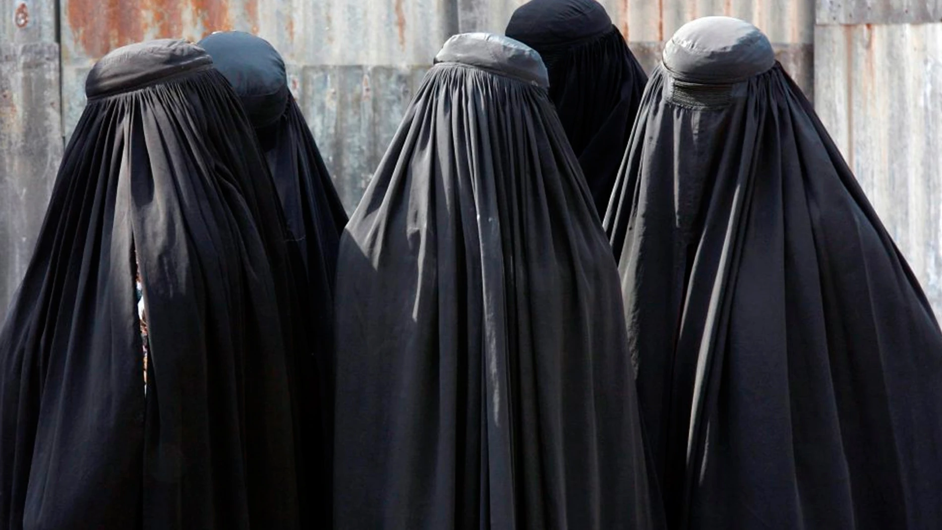 Mujeres llevando burka Mujeres llevando burka