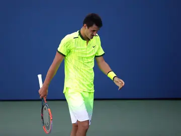 Bernard Tomic explota contra un aficionado en el US Open. Bernard Tomic explota contra un aficionado en el US Open.