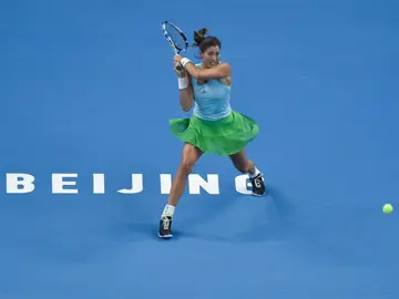 Garbiñe Muguruza, en el partido contra Begu en el Open de China Garbiñe Muguruza, en el partido contra Begu en el Open de China