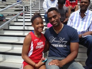 El atleta Tyson Gay y su hija