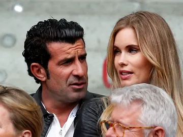 Luis Figo y Helen Svedin, durante el Masters de Madrid Luis Figo y Helen Svedin, durante el Masters de Madrid