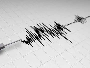 Sismógrafo registrando un temblor de tierra. Sismógrafo registrando un temblor de tierra.