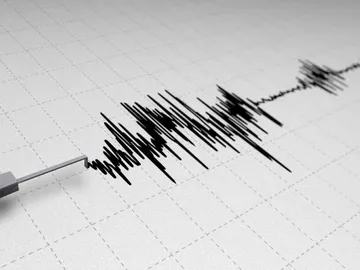 Sismógrafo registrando un temblor de tierra. Sismógrafo registrando un temblor de tierra.