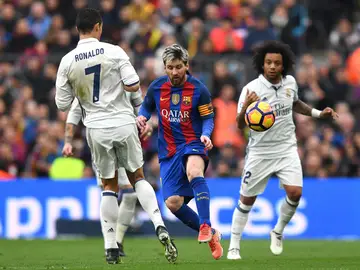 Leo Messi, Marcelo y Cristiano Ronaldo durante El Clásico Leo Messi, Marcelo y Cristiano Ronaldo durante El Clásico
