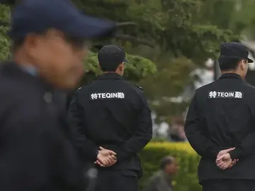 Agentes de la policía china Agentes de la policía china