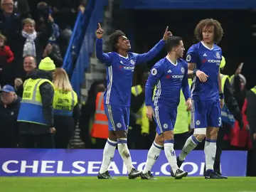 Willian celebra uno de sus goles ante el Stoke City Willian celebra uno de sus goles ante el Stoke City