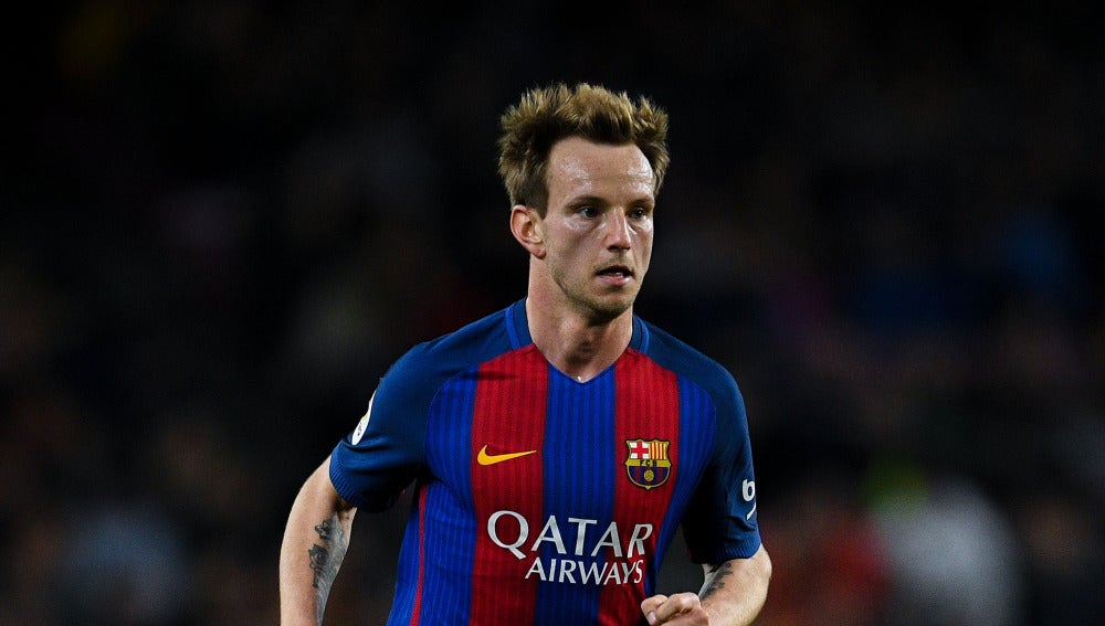 Rakitic, durante un partido con el Barça