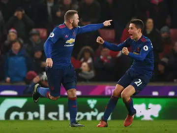 Rooney celebrando su gol frente al Stoke City Rooney celebrando su gol frente al Stoke City