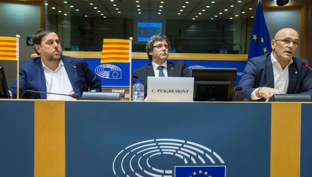 Oriol Junqueras, Carles Puigdemont y Raúl Romeva