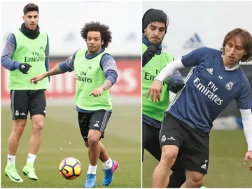 Marcelo y Modric, entrenando con el resto de sus compañeros Marcelo y Modric, entrenando con el resto de sus compañeros