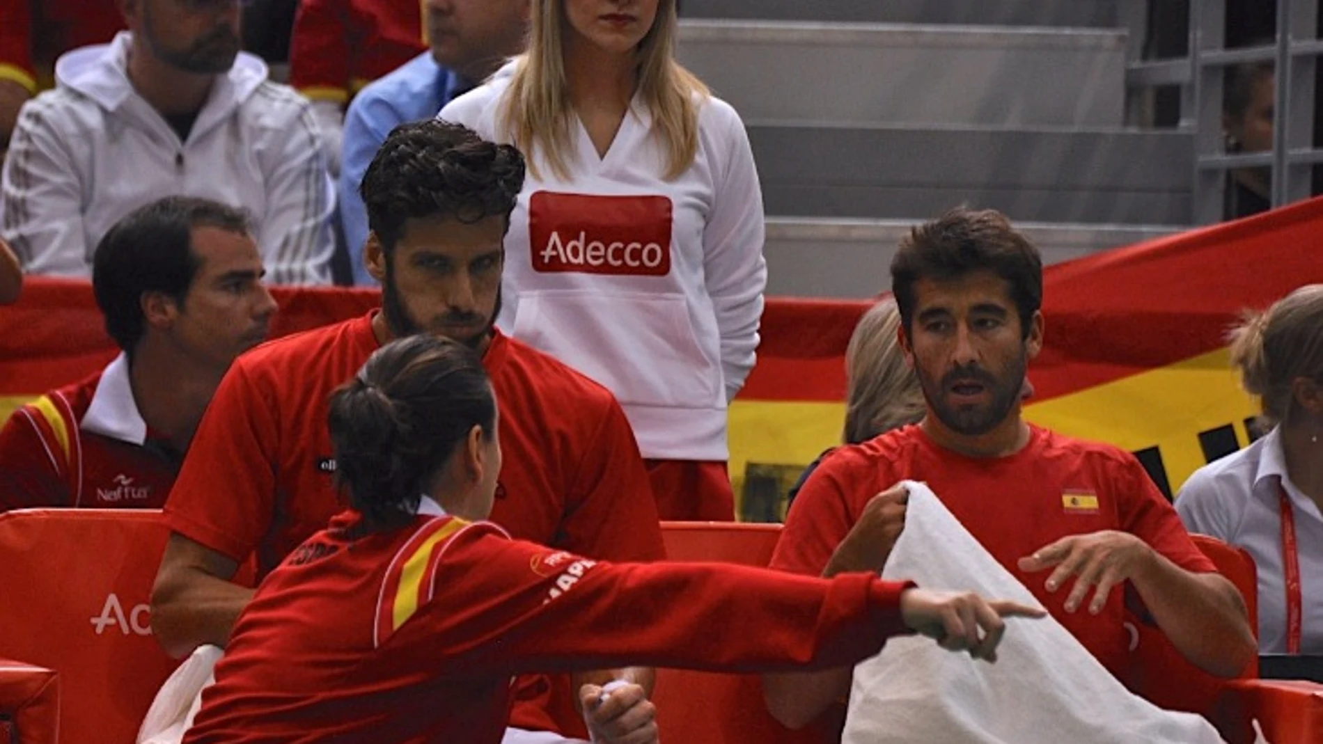 Marc López y Feliciano López reciben instrucciones de Conchita Martínez Marc López y Feliciano López reciben instrucciones de Conchita Martínez