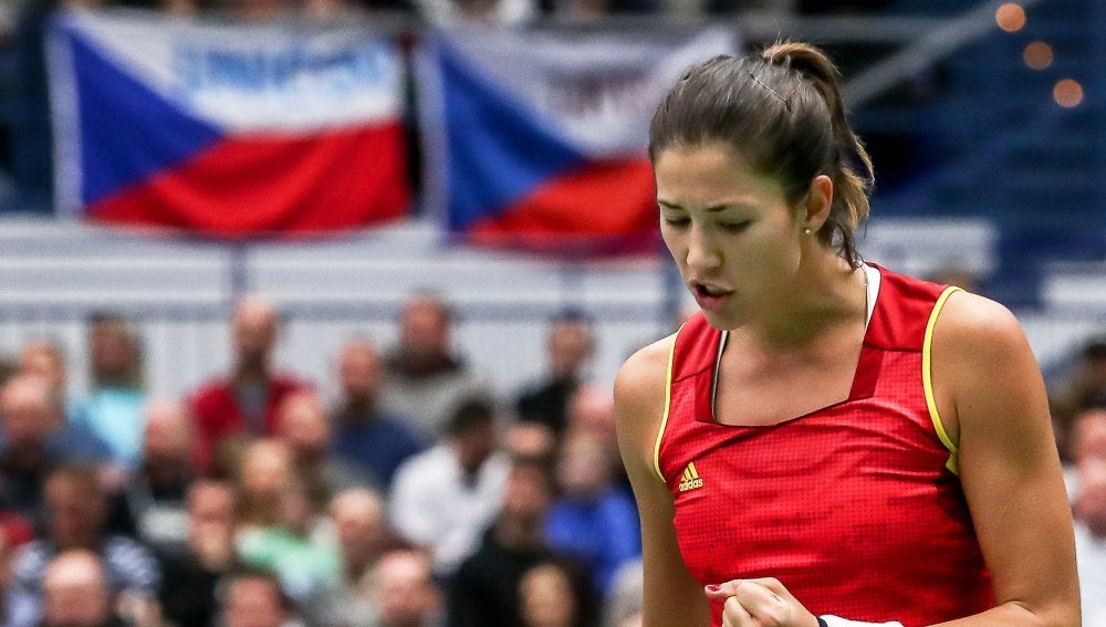 Garbiñe Muguruza celebra un punto durante el partido
