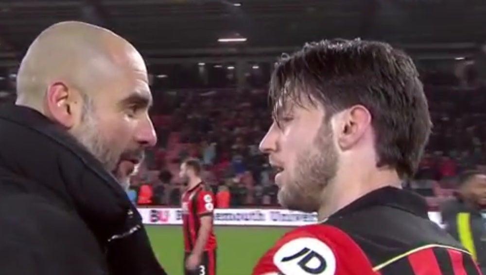 Guardiola y Arter charlan después del partido
