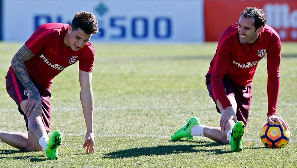 Diego Godín, con Giménez
