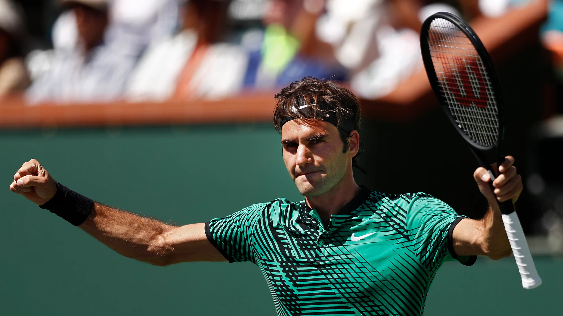 Roger Federer celebrando un punto Roger Federer celebrando un punto