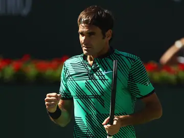 Federer celebra un punto en la final ante Wawrinka Federer celebra un punto en la final ante Wawrinka