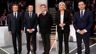 Macron y Le Pen, blanco de los ataques en un primer debate vivo y tenso