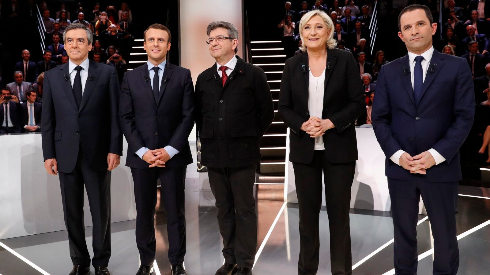 Macron y Le Pen, blanco de los ataques en un primer debate vivo y tenso