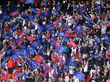 Aficionados del PSG durante un partido Aficionados del PSG durante un partido