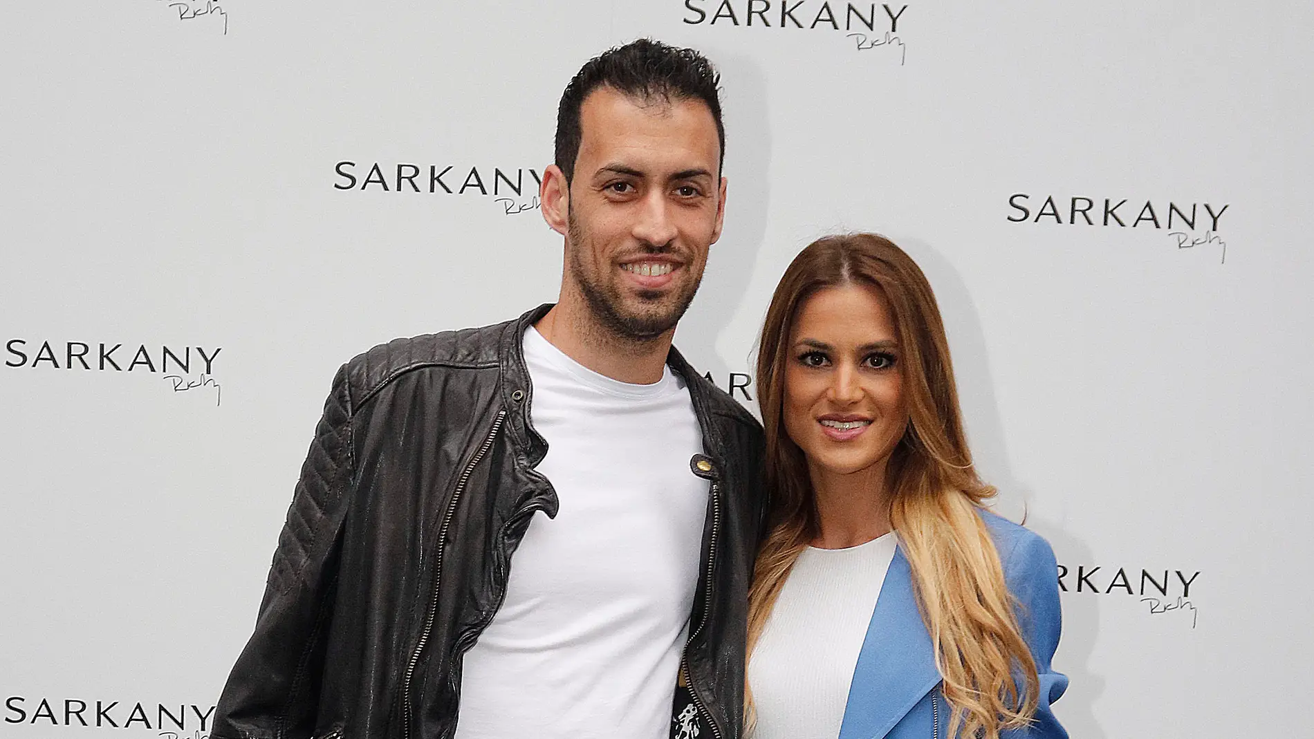 Sergio Busquets y Elena Galera