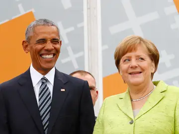 Barack Obama junto a Angela Merkel en el acto principal del Congreso de la Iglesia Evangélica Barack Obama junto a Angela Merkel en el acto principal del Congreso de la Iglesia Evangélica