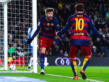 Gerard Piqué celebra un gol con Leo Messi Gerard Piqué celebra un gol con Leo Messi
