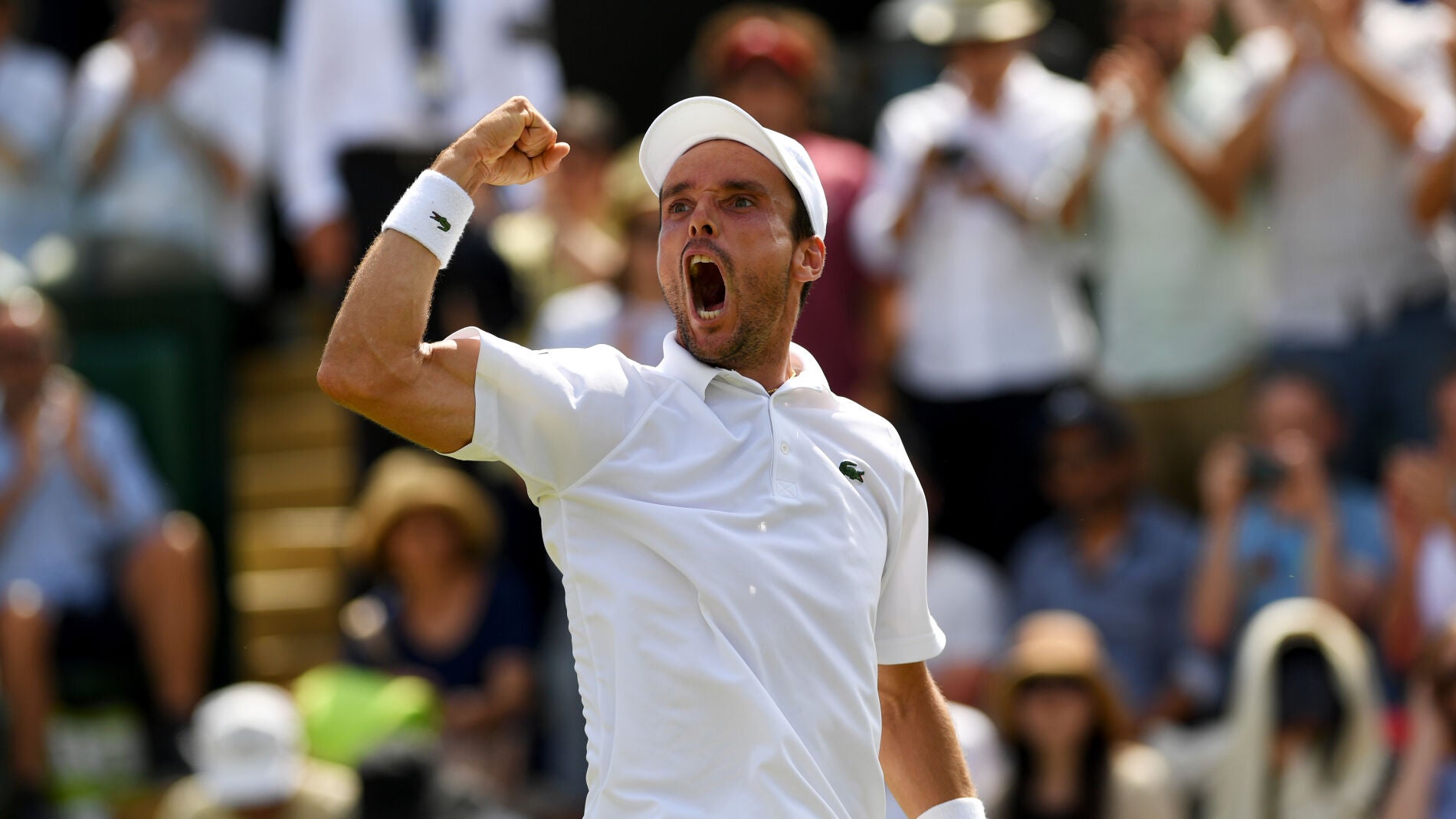 Bautista celebra el triunfo ante Nishikori