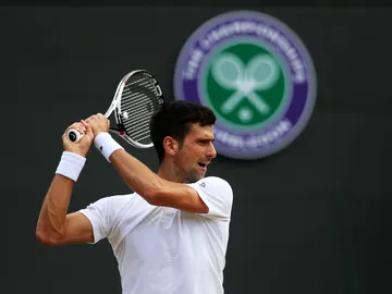 Novak Djokovic disputando un partido Novak Djokovic disputando un partido