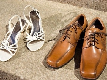 Zapatos de mujer y de hombre, imagen de archivo