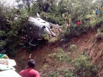 El helicóptero tras el accidente El helicóptero tras el accidente