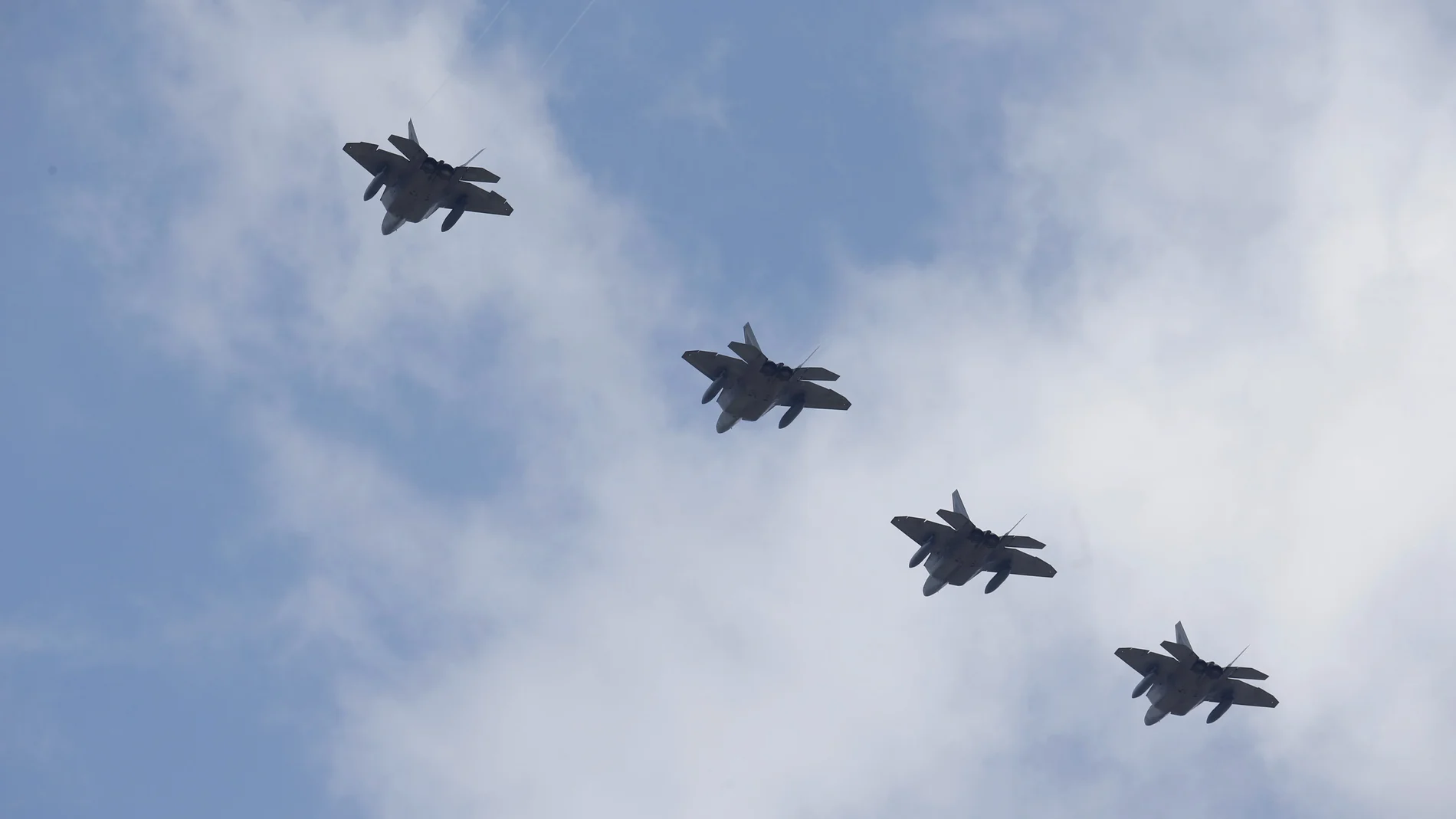 Imagen de archivo de cuatro cazas F-22 Raptor Imagen de archivo de cuatro cazas F-22 Raptor