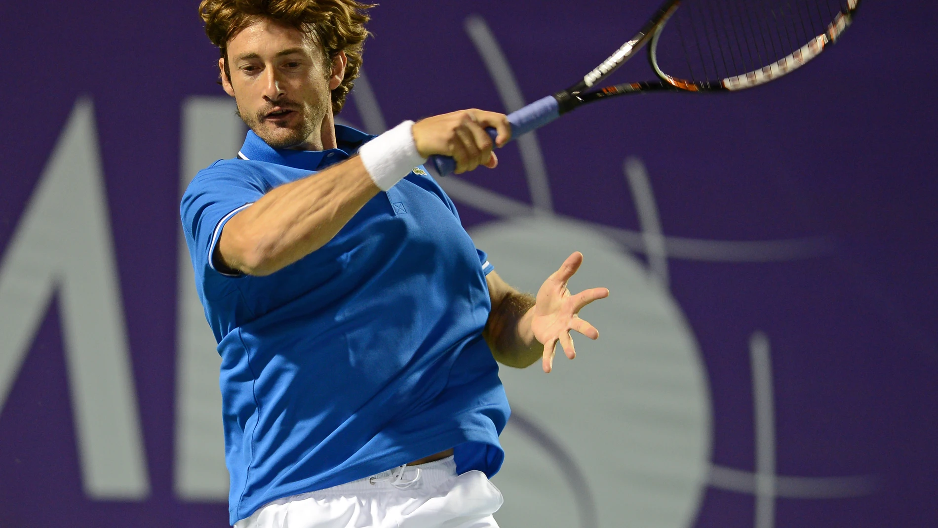 Juan Carlos Ferrero durante un partido de tenis Juan Carlos Ferrero durante un partido de tenis