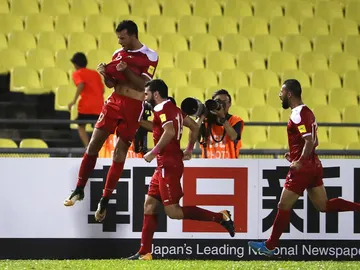 Los jugadores sirios celebran su gol contra Australia Los jugadores sirios celebran su gol contra Australia