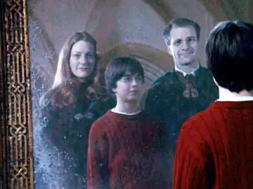Harry Potter con sus padres Harry Potter con sus padres