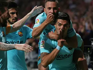 Luis Suárez celebra un gol con rabia Luis Suárez celebra un gol con rabia