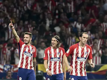 Saúl celebra con Filipe Luis y Godín un gol del Atlético Saúl celebra con Filipe Luis y Godín un gol del Atlético