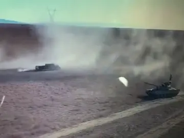 Duelo entre un tanque y un vehículo terrorista cargado de explosivos en Irak Duelo entre un tanque y un vehículo terrorista cargado de explosivos en Irak