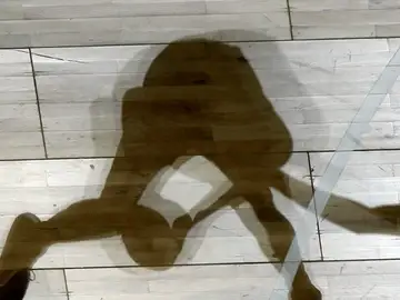 La sombra de dos jugadores de baloncesto La sombra de dos jugadores de baloncesto