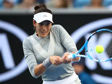 Muguruza golpea de revés durante su partido ante Ponchet Muguruza golpea de revés durante su partido ante Ponchet
