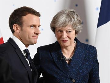 May y Macron se reúnen en Londres.