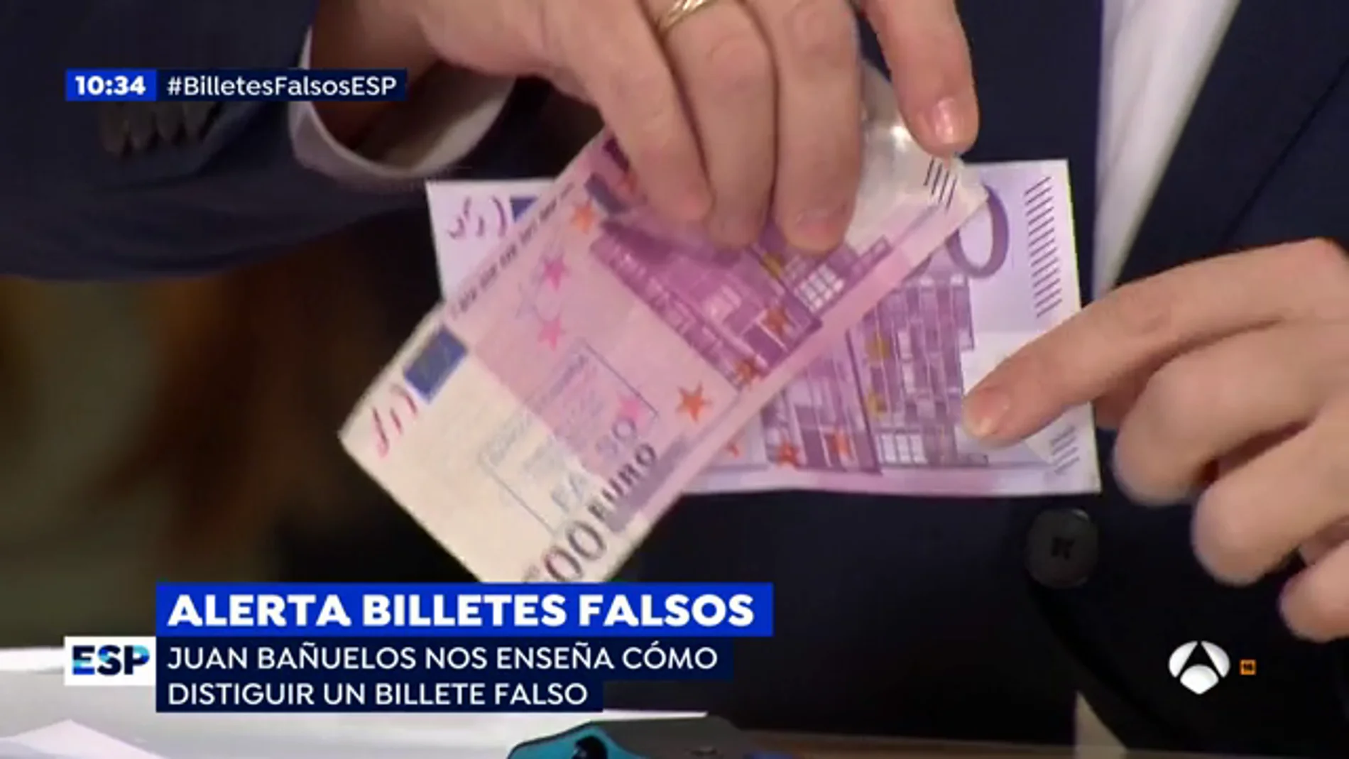 Juan Bañuelos, jefe de la brigada de falsificaciones del banco de España, muestra las clave para detectar los billetes falsos: "Mirar, tocar y girar"