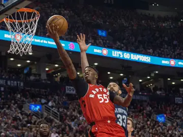 Wright encestando a canasta Wright encestando a canasta