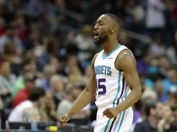 Kemba Walker celebra una canasta Kemba Walker celebra una canasta