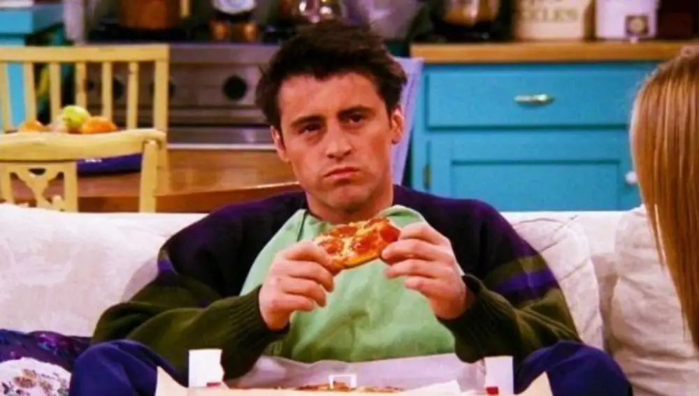 Joey comiendo pizza en 'Friends' Joey comiendo pizza en 'Friends'