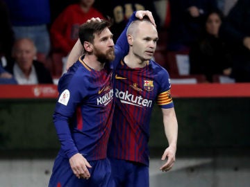 Messi, con Iniesta