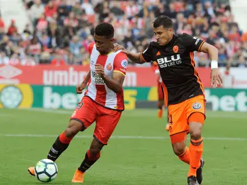 Murillo y Boulaya disputando un balón Murillo y Boulaya disputando un balón