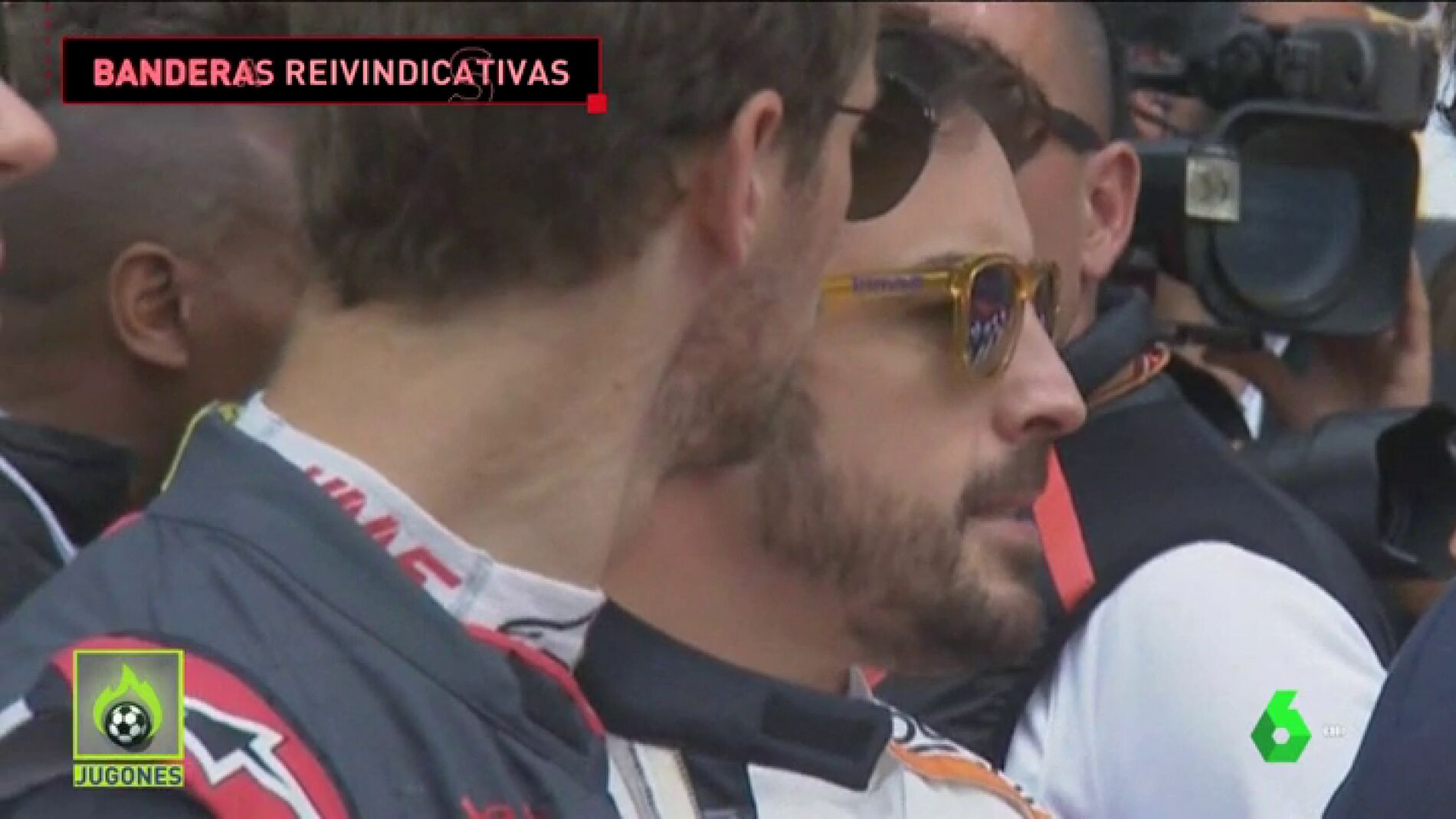 Alonso y Sainz, molestos con la excesiva duraci&oacute;n de 'Els Segadors', decidieron exhibir la bandera de Espa&ntilde;a